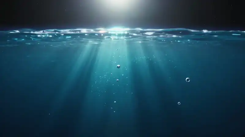 A glowing Earth silhouette looms over a vast turquoise ocean